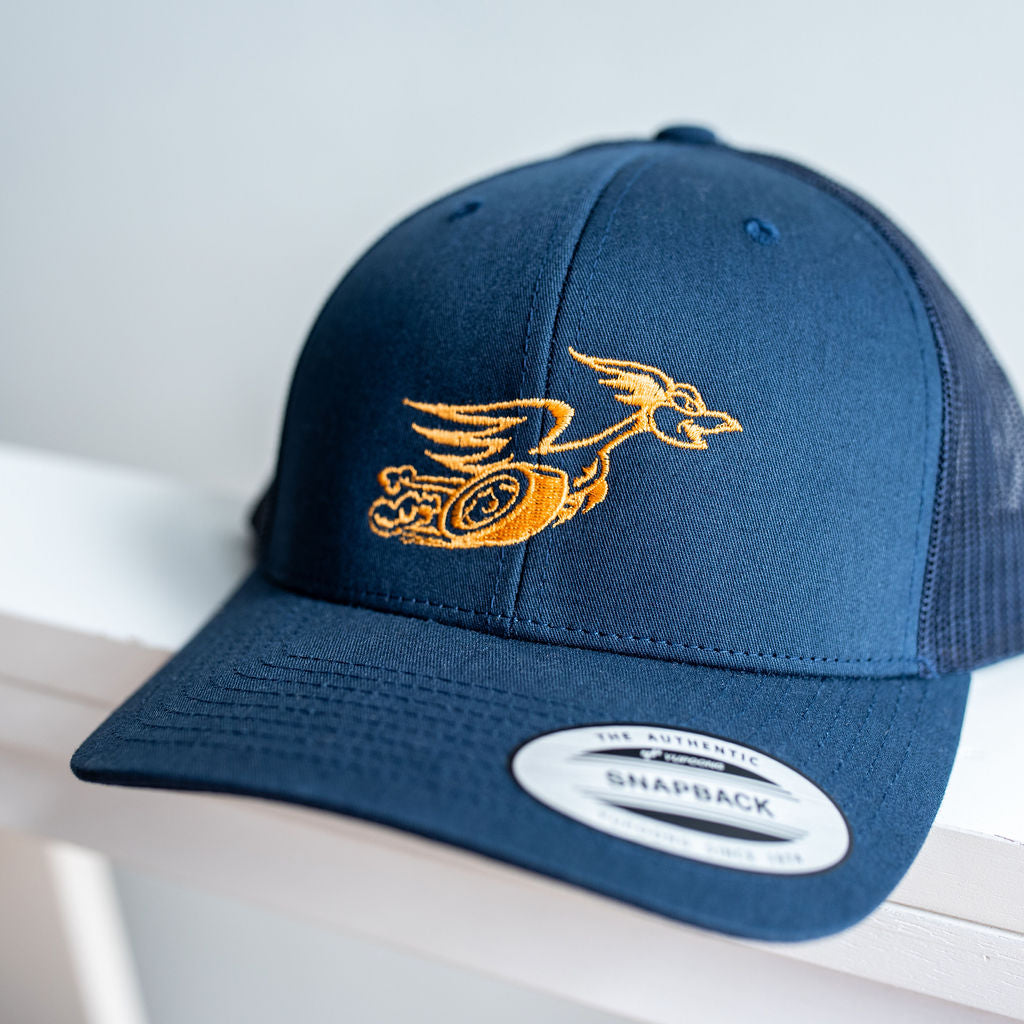 Snap-back cap with embroidered roadrunner